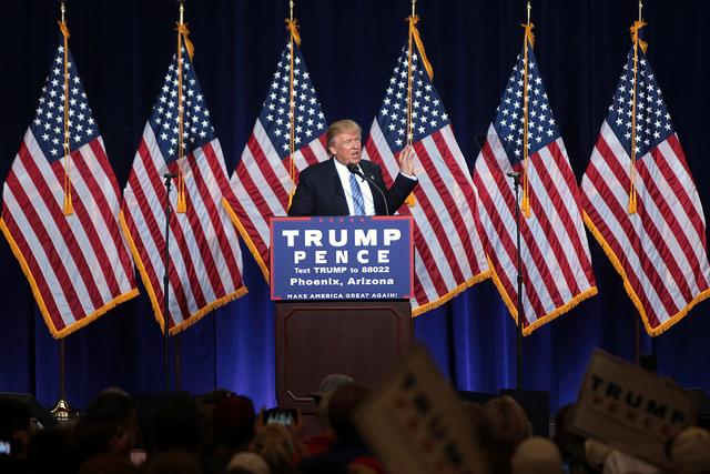 Donald Trump speaks to supporters at an immigration policy speech in Phoenix, Arizona. (Flickr/Gage Skidmore)