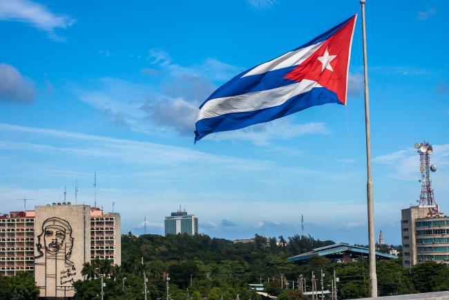 The Cuban flag flying over the Plaza de la Revolución in Havana ( Gilbert Sopakuwa, Flickr)