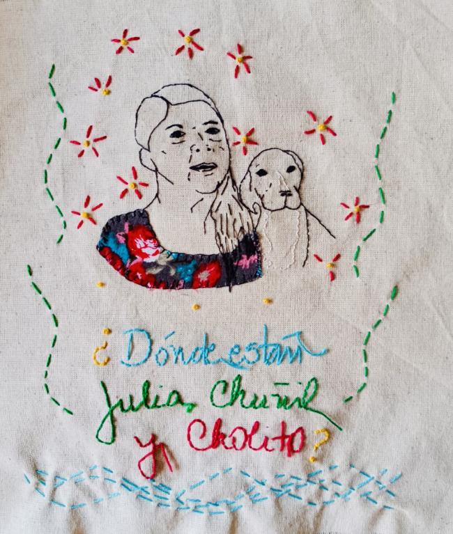 An embroidered image of Julia Chuñil and her dog Chollito done by the Memorarte embroidery project. (Marcela Libuy Hidalgo)