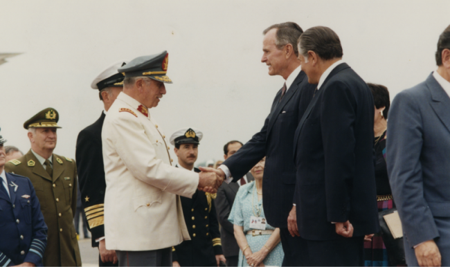 Augusto Pinochet with George H.W. Bush
