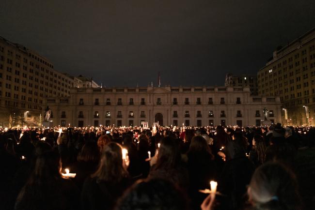 “Nunca más” (Never again). At a candlelight vigil on September 10, 2023, thousands of women shouted the phrase in unison again and again. (Anita Pouchard Serra)