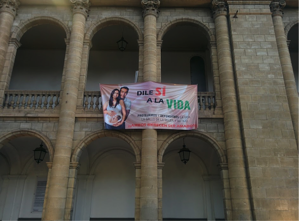 A pro-life banner displayed on the Cochabamba Cathedral in Plaza 14 de Septiembre in Cochabamba, Bolivia. “Say yes to life. Protect and defend life the health of women and their children. Both deserve to be loved!" (Photo by Jennifer Zelmer)