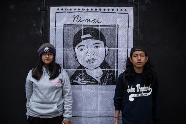 The family of Yudhisthir “Nimai” Piña Villarruel painted his face on the walls of the Mexico City Special Prosecutor's Office for Disappeared People in protest of the institution's mishandling of the case, on December 23, 2024. (Axel Hernández)