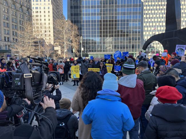 City advocates and migrant rights groups rally outside City Hall on Monday to denounce an inhumane 60-day limit on shelter for newly arrived asylum seekers. (Julianne Chandler)