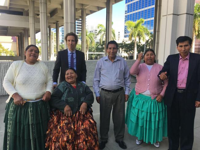 Plaintiffs at the trial in Fort Lauderdale in 2018, with Teófilo in the middle