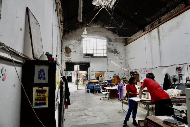 The Esquina Libertad cooperative's printing house offers workshops to incarcerated individuals on printing techniques and produces magazines, books, and banners. (Josefina Salomón)