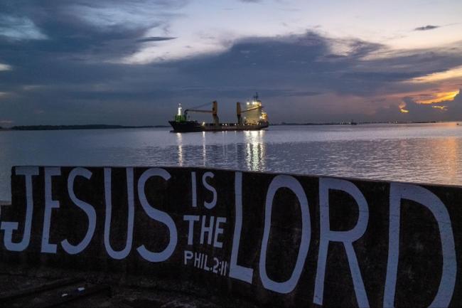 An oil tanker is seen at the mouth of the Demerara River in Georgetown, Guyana. (Rafael Vilela / Agência Pública)