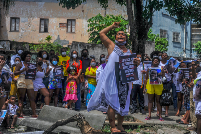 Residents of Gamboa de Baixo in Salvador, Brazil demand justice for Patrick, Alexandre, and Cleberson, three Black youths killed by Bahia state military police on March 1, 2022. (Felipe Iruatã)