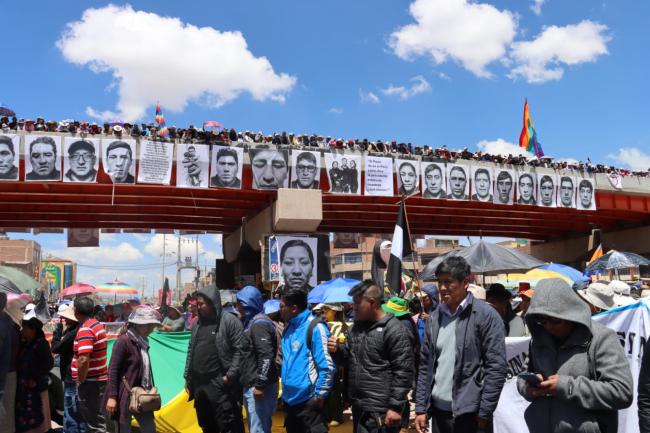 Images of the victims of the massacre are displayed on a bridge in Juliaca as part of the anniversary commemorations on January 9. (Photo courtesy of Derechos Humanos y Medio Ambiente - Puno, Peru)