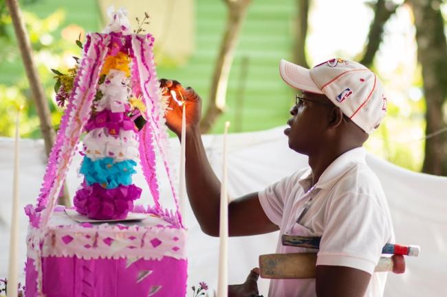 Member of the Cofradía de los Congos del Espíritu Santo de Villa Mella participates in a vigil in Mata de los Indios. (Guillermo Casado)