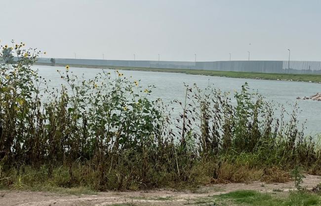 A view of the border wall (from We Build the Wall) near where the author camped. (Todd Miller)