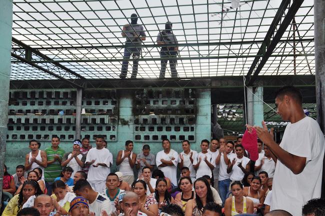 Officials from the Organization of American States (OAS) visit the prison of Quezaltepeque in 2012 as part of part of an assessment of the country’s gang truce. Arena Ortega (OAS / Creative Commons)