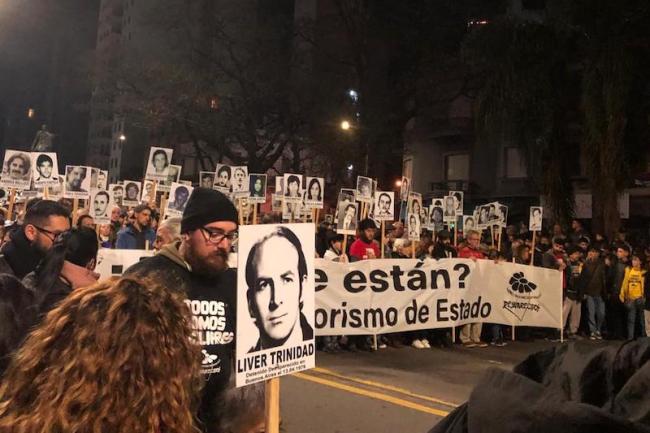 "Where are they? State terrorism never again." The Madres y Familiares de Desaparecidos del Uruguay lead the Marcha del Silencio in Montevideo, May 20, 2023. (Isabella Fried Leeman)