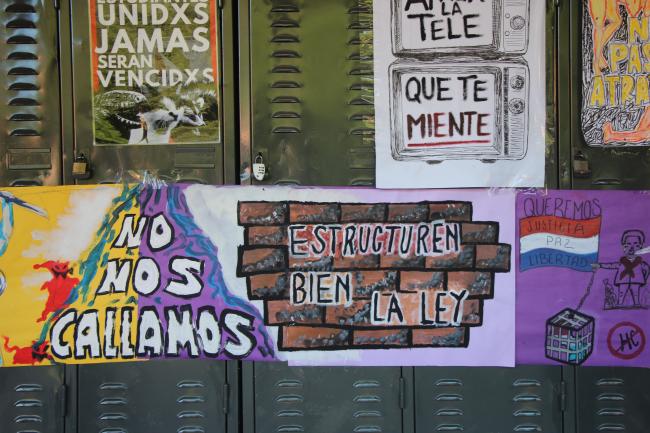 Protest posters at the National University of Asunción’s Faculty of Architecture, Design and Art. (William Costa)