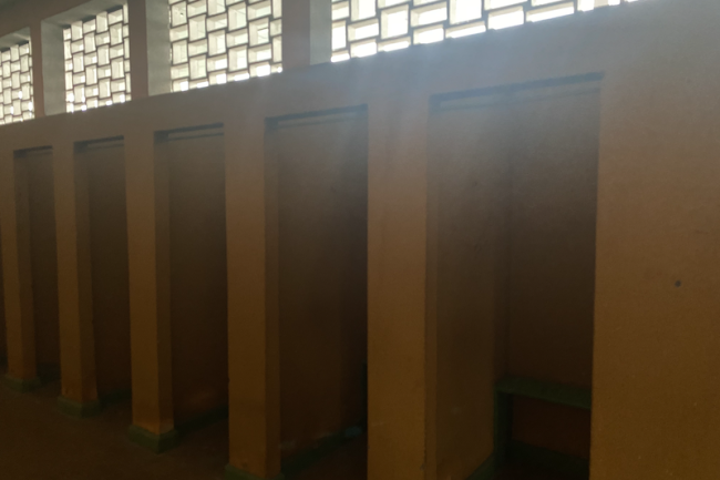Changing stalls in the Women's Locker Room at Chile's National Stadium. (Hillary Hiner)