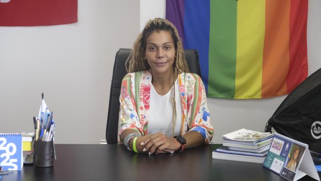 Dani Balbi was the first transgender woman to be elected to Rio state’s legislature in 2022. Her office in downtown Rio is decorated with the trans and rainbow pride flags. (Constance Malleret)