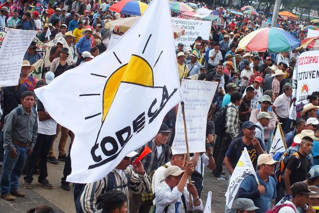 CODECA, the Campesino Development Committee, has been organizing protests like those held in April for years. Here a photo from a 2018 protest in Guatemala City. (Ollantay Itzamná, Wikimedia Commons)