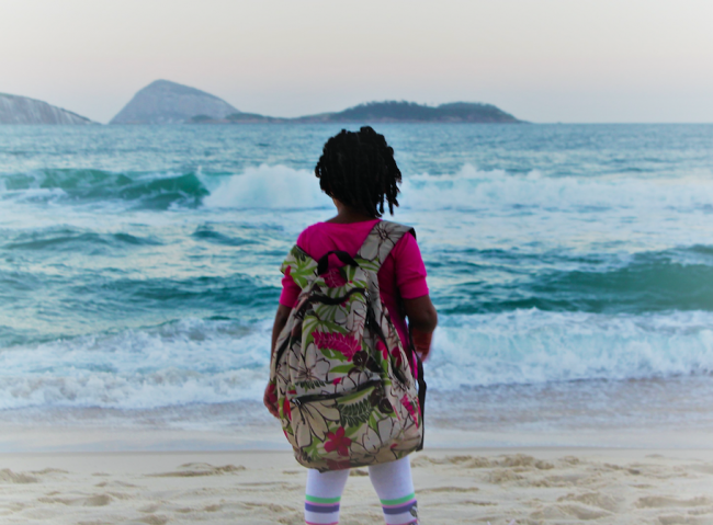 Duda stands in awe of the water in Ipanema, Rio de Janeiro, Brazil, July 2012. (Katia Costa Santos)