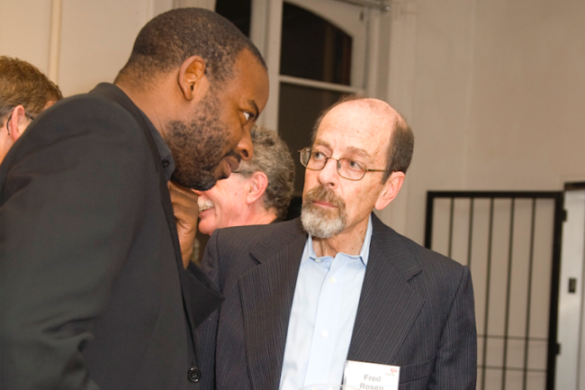 Fred Rosen with Steve Cupid Theodore at a NACLA benefit gala, 2008. (Erin Nicole Brown / NACLA)