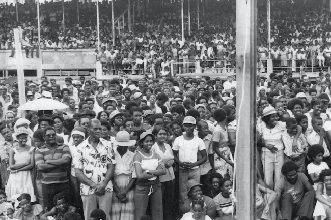 People gather for a packed rally during the Revolution, March 1979. (Grenada National Museum)