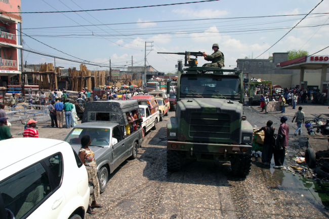 A U.S. Marine convoy makes its way through Port-au Prince, Haiti, April 5, 2004. (CPL Eric Ely / U.S. Marine Corps)