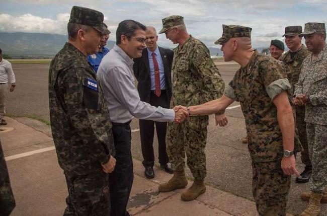 President Juan Orlando Hernández greets a U.S. Marine at the Soto Cano air base in Honduras, June 21, 2019. (U.S. Marine Corps photo by Cpl. Stanley Moy)