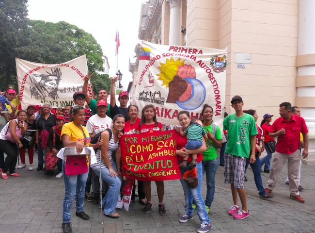La Juventud Rebelde de Kaika Shi represent the community at a public rally, 2016. (Andreina Torres Angarita)