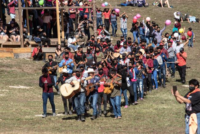 Zapatista youth play music at the anniversary gathering. (Alejandro Meléndez Ortiz)