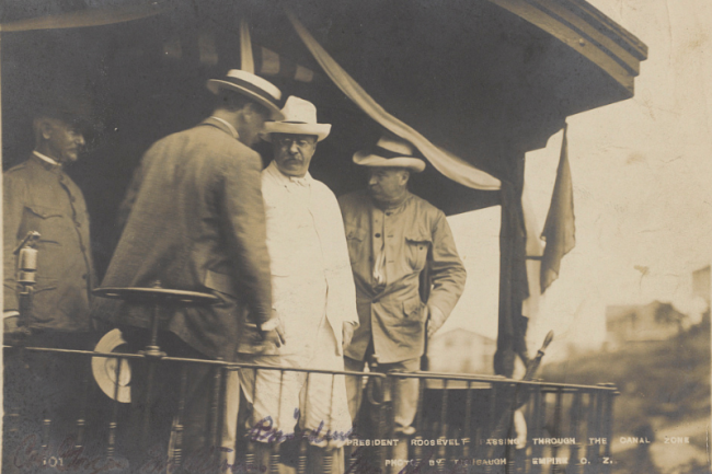 President Roosevelt passes through the Canal Zone on the back of a train car, 1906. (Fishbaugh, Empire, C.Z., Library of Congress)