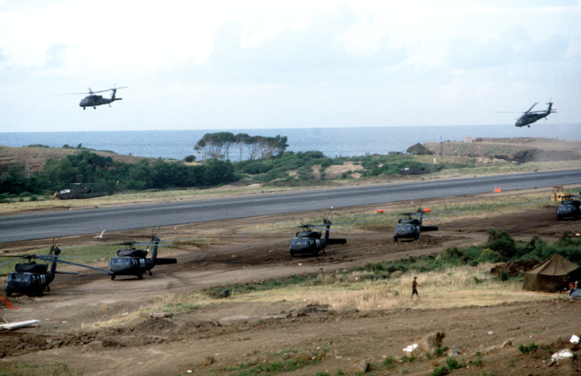 U.S. Army helicopters at Point Salines airfield during Operation Urgent Fury, 1983. (Department of Defense)